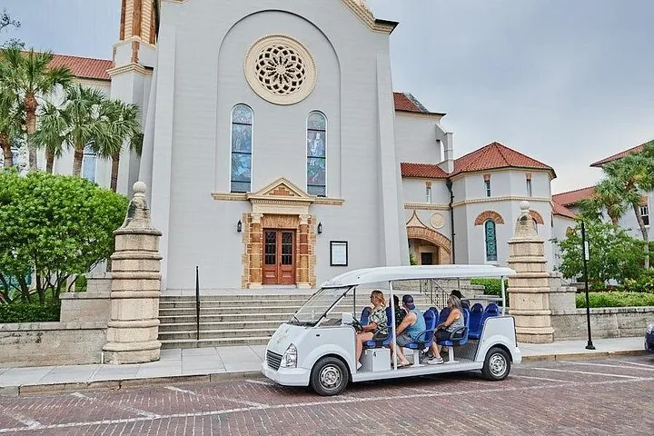 An open-sided electric tour vehicle downtown, an alternative to St. Augustine carriage tours, Florida