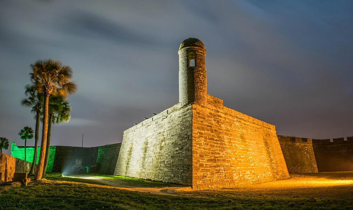 Castillo de San Marcos lit at night, on the evening route of St. Augustine carriage tours