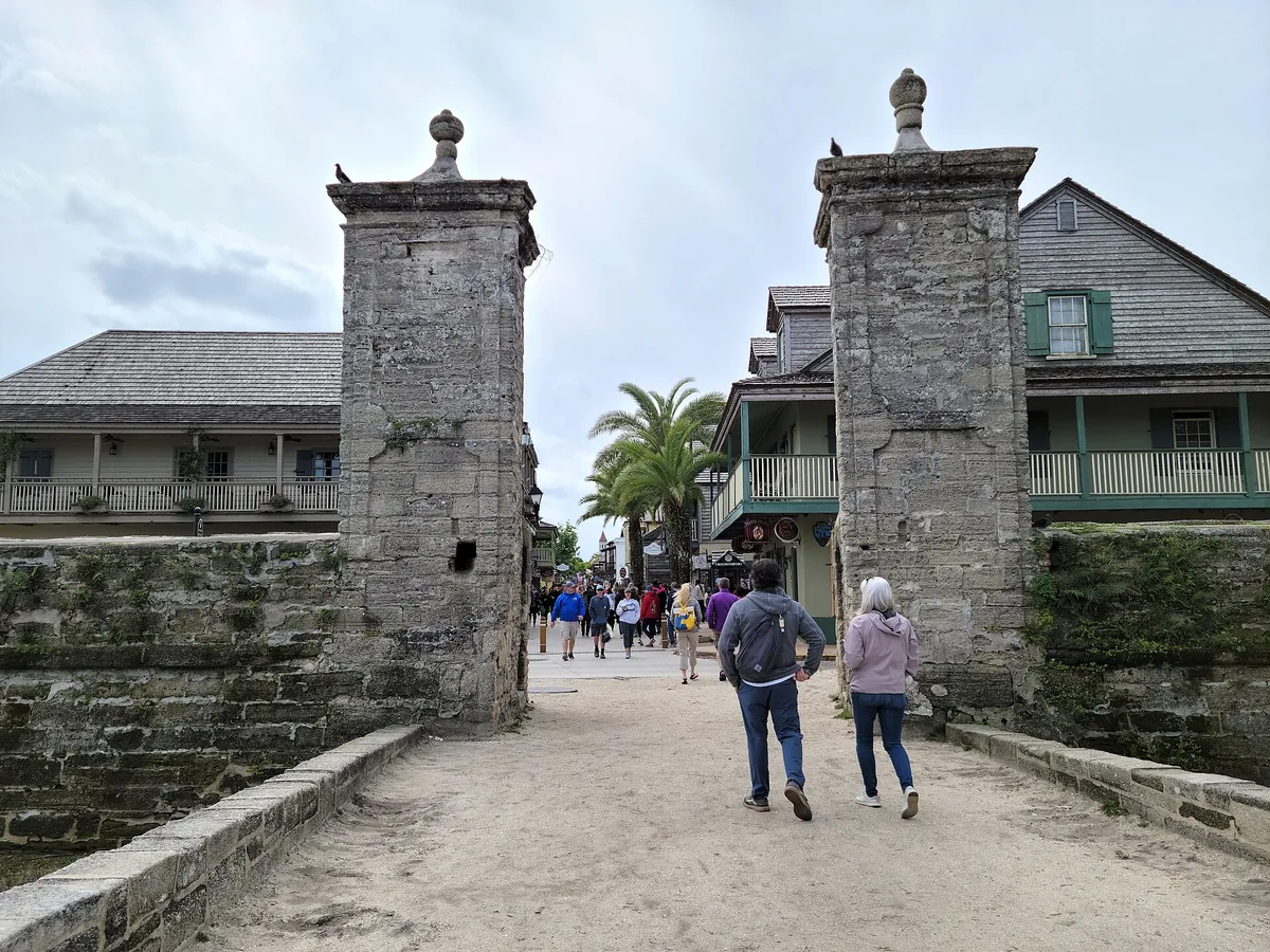 The coquina pillars of the City Gate at the end of St. George Street, near St. Augustine carriage tours